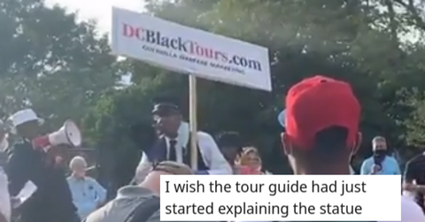 black tour guide statue