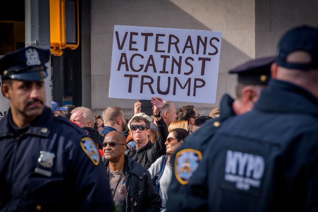 Protesters booed and chanted during Trump's speech at the Veterans Day ...