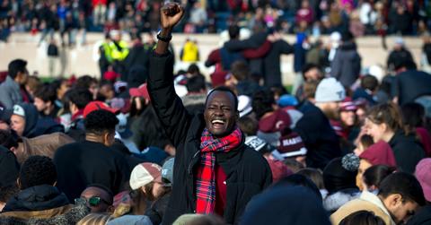 climate protest interrupts harvard yale football game