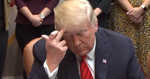 trump-middle-finger-nasa-1571760516934.jpg