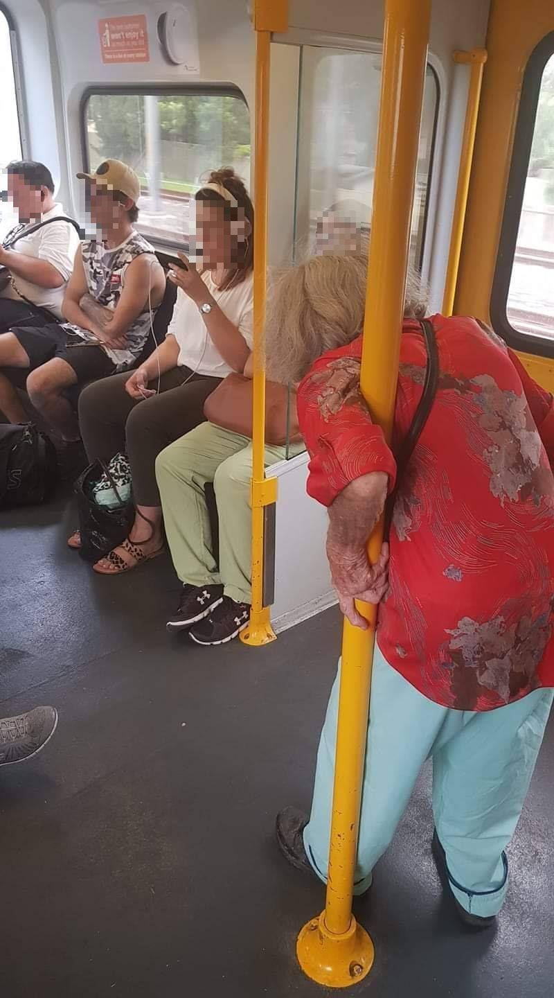 elderly woman train